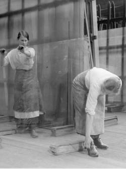 Two women eengaged in construction work